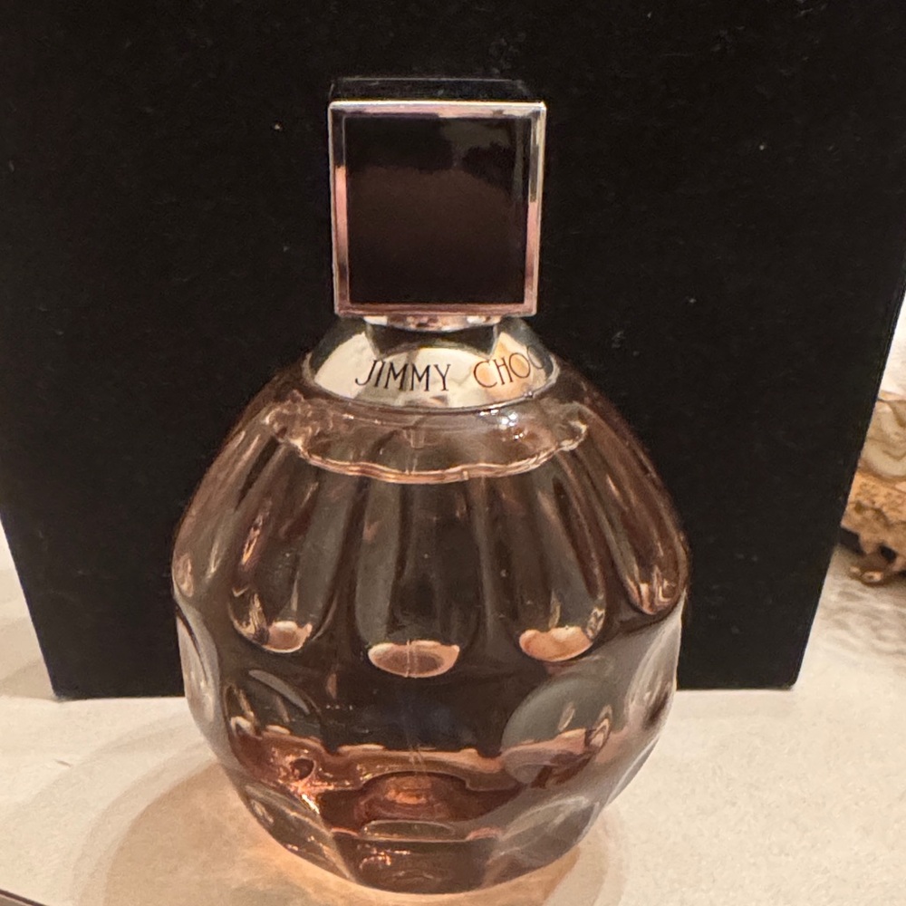 Jimmy Choo Perfume Bottle with Pink Hue